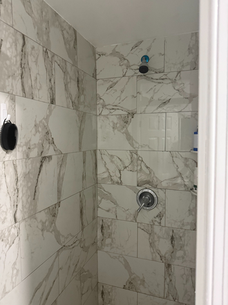 Bathroom on the first floor - 6 BEDROOM / 3 FULL BATHROOM FULLY REMODELED Townhome