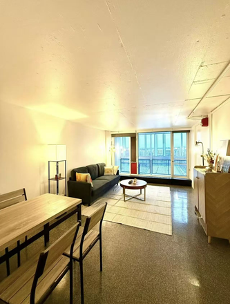 Living Room - Peabody Terrace Apartment with Stunning River View
