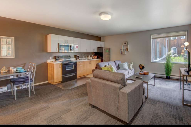 living room (NOT SAME UNIT) - Yugo Skybox, 3 Bed 2 Bath, next to Matthew Knight Apartments