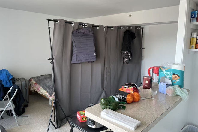 Living room - Large River-View Living Room Close to Campus Apartments