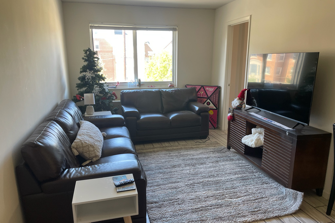 403 living room - 4th Floor, Perfect for 2 or 3 - one block off campus, balcony include Condo