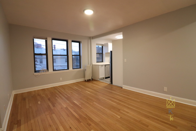 living room - Recently Renovated 2-Bedroom + Den Apartment for Rent