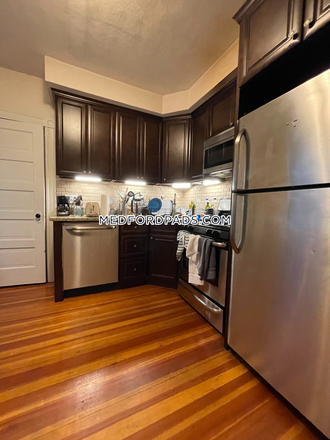 Kitchen - 4bd/2.5 bath -w/d in unit -6/1/24 - Main st Apartments