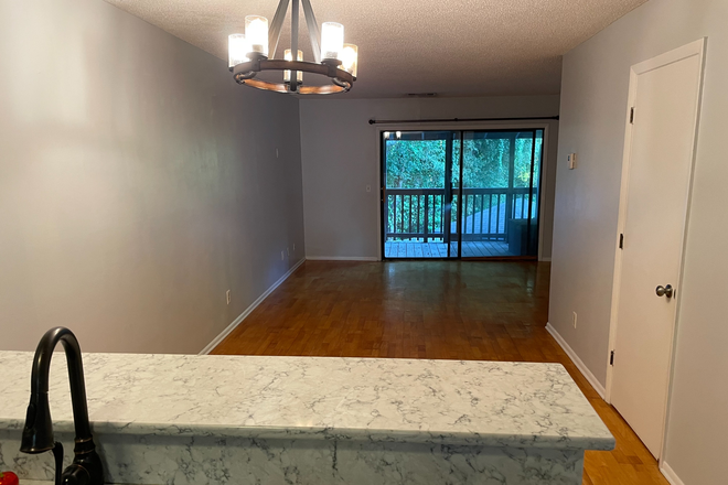 Dining leading into living area - James Island 2 Bed 1.5 Bath Condo
