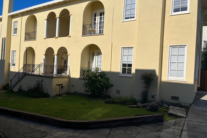 Exterior of front , arched entry, recessed balconies - Furnished Sublet Beautiful, Light-Filled Flat in a great North Berkeley location. Bay views, garden