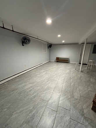 Living room - Private Corner House with Ample Parking.  Quiet neighborhood.