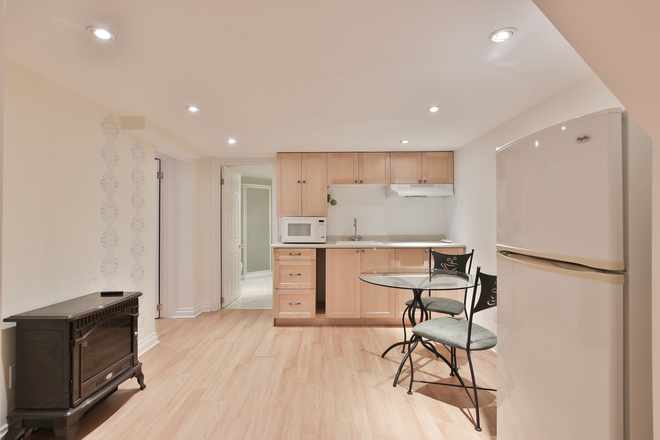 Kitchen and dining area - One bedroom furnished apartment in a century-old home in quiet neighbourhood