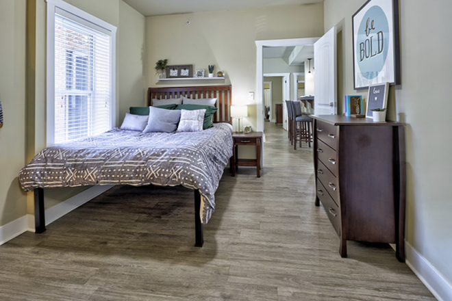bedroom - The Lodges of East Lansing Apartments