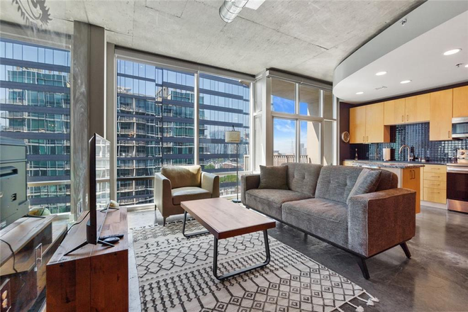 Living Room - Move-in Ready 1-Bedroom Midtown Luxury Condo - Fully Furnished!