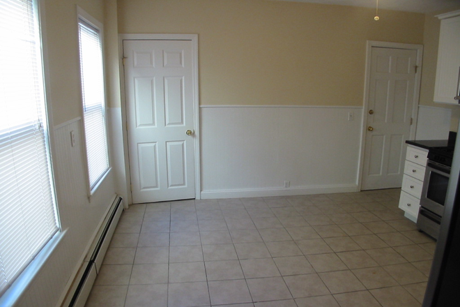 2 - Spacious apartment near MIT with yard, storage, private laundry.