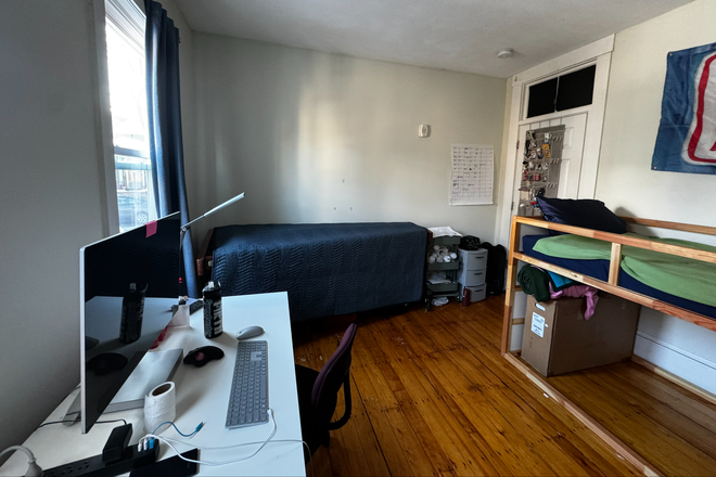 Bedroom, viewed from opposite corner to door. The large blanketed object (instrument) will be gone - Summer Sublet: Furnished Bedroom ~20 minute walk to MIT Condo