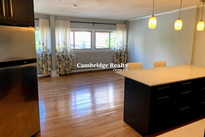 Kitchen/Living - Modern 2 Bed, 1 Bath - Avail. 9/1 - One Parking Space Included! Condo