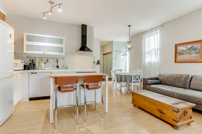 Open concept Kitchen Living room - Fully Furnished 2 Bedroom In Family Friendly Little Italy Walking Distance to UofT Triplex