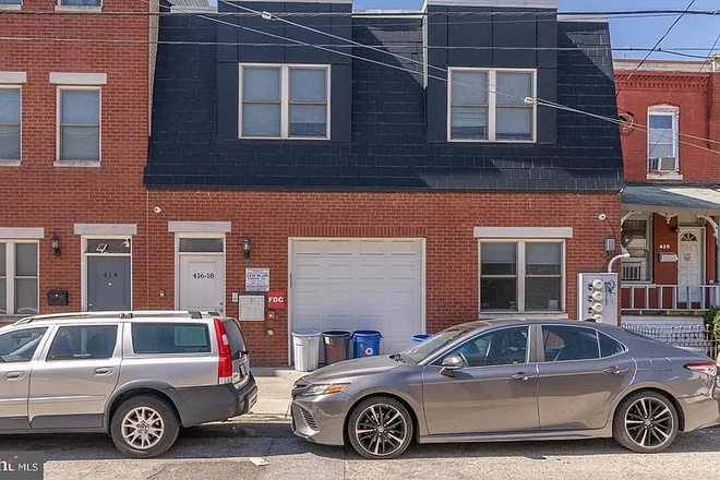 Entrance. Garage available for additional fee. - Walk to Drexel – Spacious 2BR in Great Neighborhood - Parking Garage available Triplex