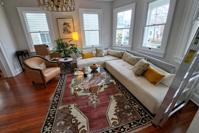 Spacious living room filled with natural light - Charming Queen Anne Home Away from Home- 0.8 Miles from MUSC