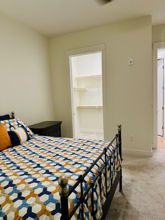 Bedroom with walk in closet - Across the street from Regis University Newer  Zen condo