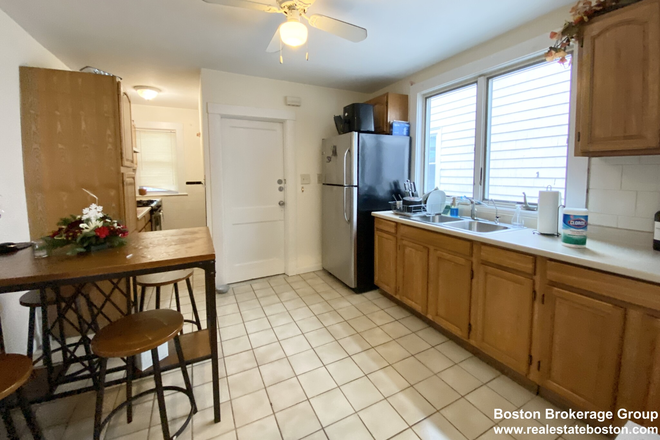 kitchen - Spacious and Sunny 3 Bed | Private Deck and Yard | Walk to Red Line Condo