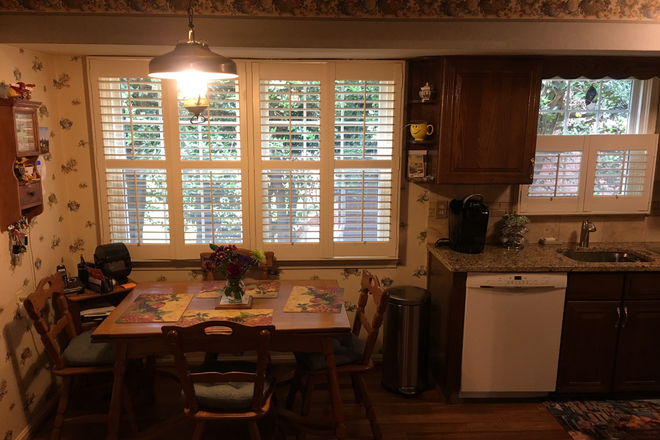 Shared kitchen table - Affordable furnished room with kitchen and laundry use,  on bike path in College Park Woods House