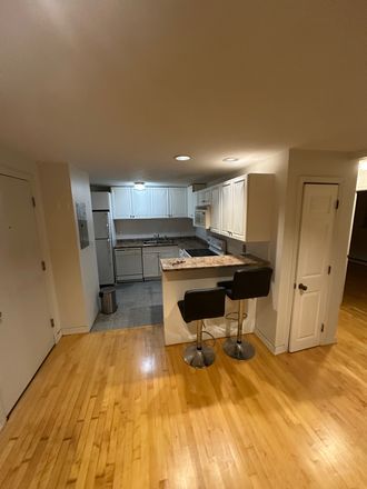 View from LR looking into Kitchen - Commonwealth Square Condominiums