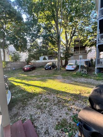 Shared yard - 3 bed / 2 bath - in unit W/D and with off street parking. Close to multiple T and bus lines Triplex