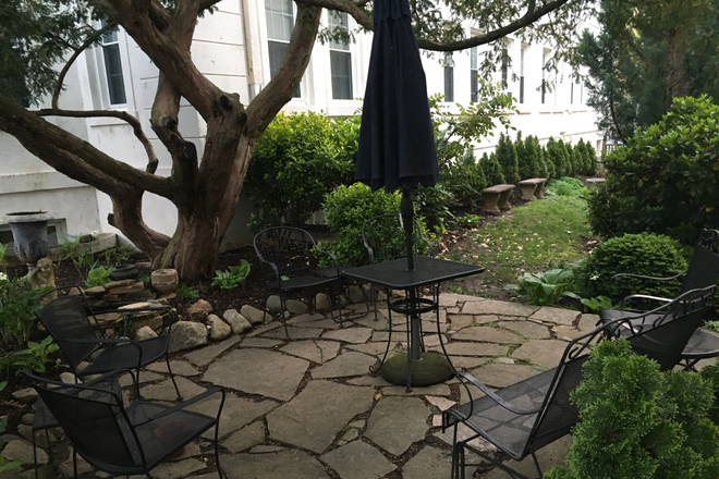 Building patio - $850.00 month furnished efficiency includes all utilities and WiFi Apartments