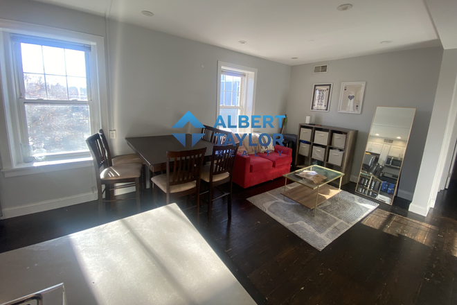 Living Area - Gorgeous 4Bed/2Bath STEPS from ISEC/NEU! In-Unit Laundry! Apartments