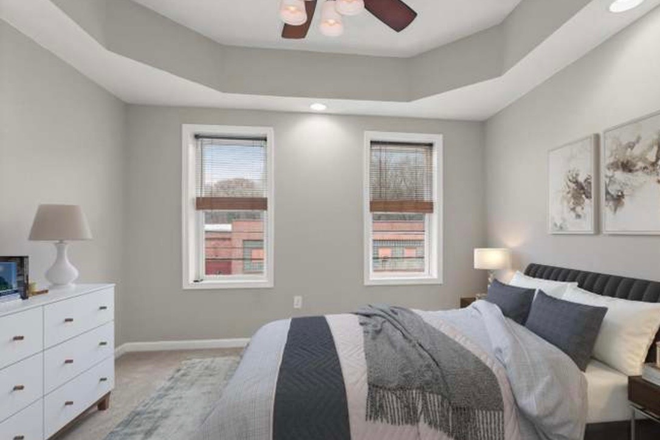 bedroom with furniture in it (not included) - Looking for 3rd roommate in our rowhome!