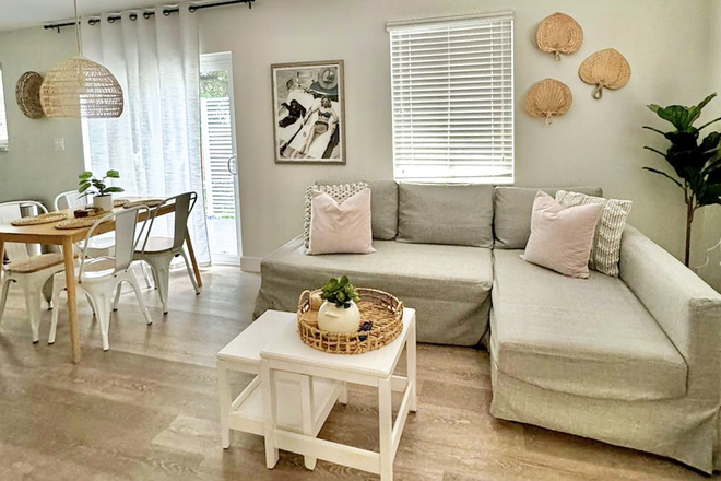 Living room and dining room - Duplex close to UM Medical Campus, JMH, and Civic Center