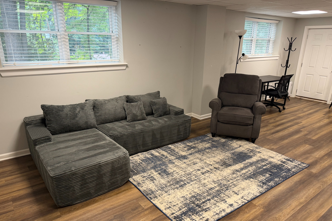 Living area - Very nice one bedroom, daylight basement apartment.
