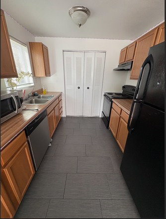 Kitchen - Apartment ten minute walk, five minute bus ride to campus!