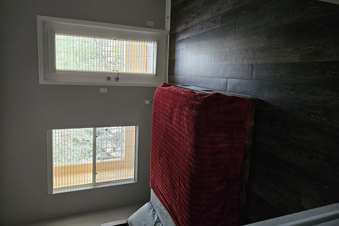 bedroom with balcony door - Mallorca Square Condo