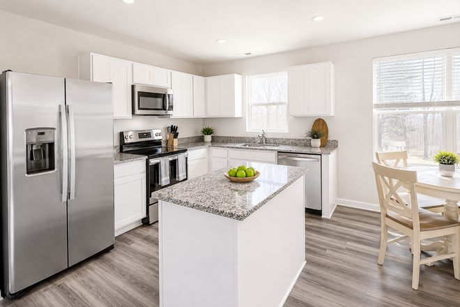 Modern full kitchen with island - Furnished 3BR Near Duke Hospital | Garage + Utilities Included Townhome