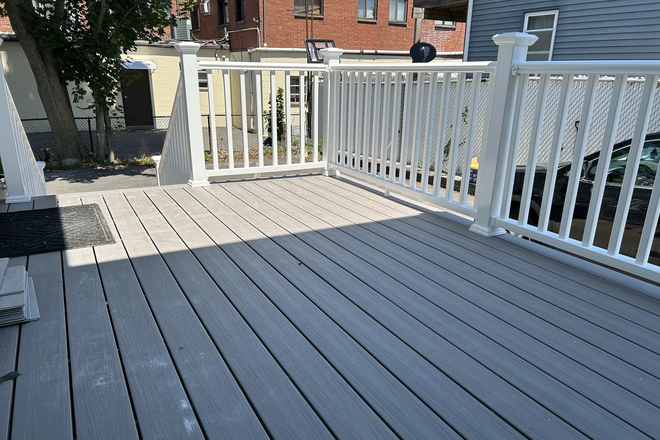 Deck - Big three floor townhouse with 4 bedrooms and 3 bathrooms available now!