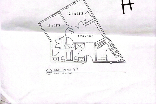 Floorplan with multiple bedrooms, shared living space, kitchen and bathrooms - 15th Street Corner Apartments