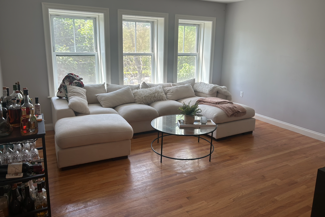 Living room - Year long Lease 9/1 Apartments