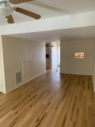 living room rear view - Walk 2UVA  2bed/2bth,Ting,water/sewer Included.