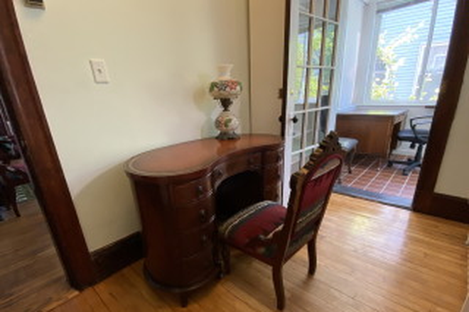 Study area and enclosed porch - large one-BR/one Bath Furnished unit on quiet street next to Cambridge line Condo