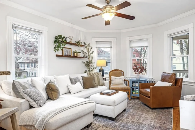 Living room - 4 BR + Office On East Side avail 12/1 Apartments