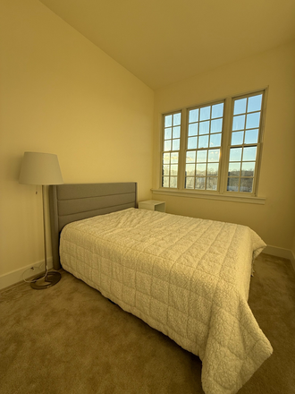 Second Bedroom partially furnished - 4 Bedroom 3 bath Luxury Townhome Partially Furnished