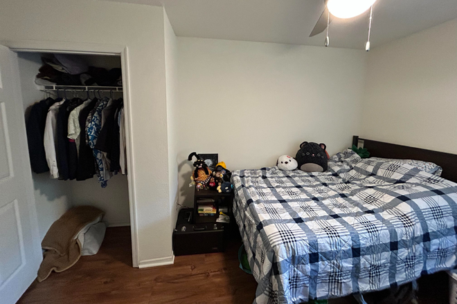 Bedroom - closet and bed - University Club Apartments 4x4 Spring 2026 (through Summer if desired)