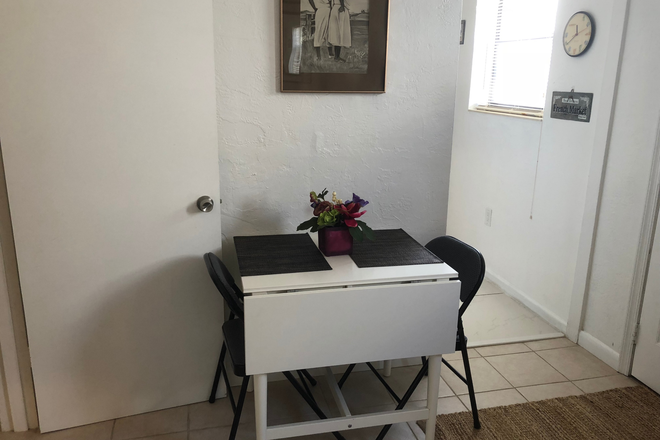 Dining area in living room - Historic Coconut Grove, close to public transportation, MetorRail & Cocowalk Apartments