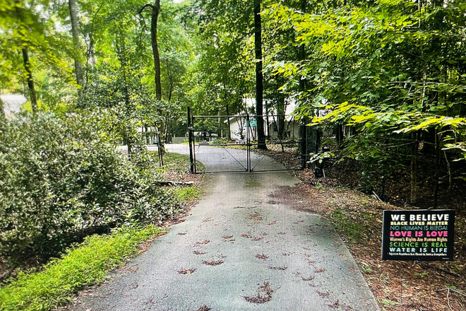 Driveway, Fence, Cottage in backround - Two bedroom Cottage in the Woods between Durham and Hillsborough Apartments