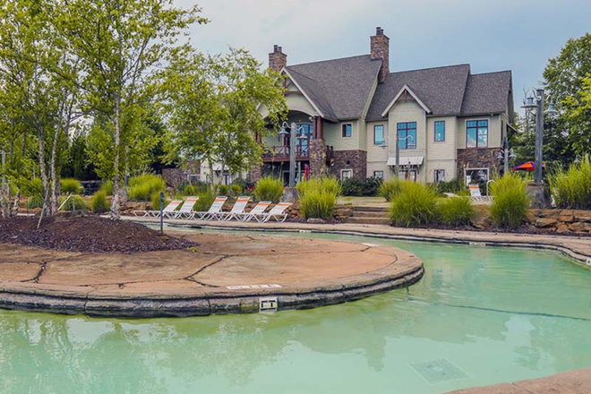 A bend in the Lazy River at the clubhouse of The View. - $700 ALL-INCLUSIVE | 1721 sf • Privately Keyed 4x4 Luxury Condo | TWO MONTHS FREE + $1000 GIFT CARD