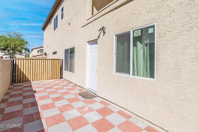 A spacious multi-story home floor plan featuring a kitchen, two distinct living rooms, and 3.4 bathrooms. - Elijah House
