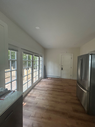 Spacious dining area in kitchen. - Spacious, Sunlit, Renovated 3-4 Bedroom with Cute Shared Yard Triplex