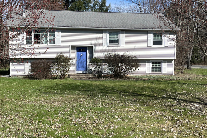Front street side of home - Private room in shared apartment, right near bus stop in Amherst!