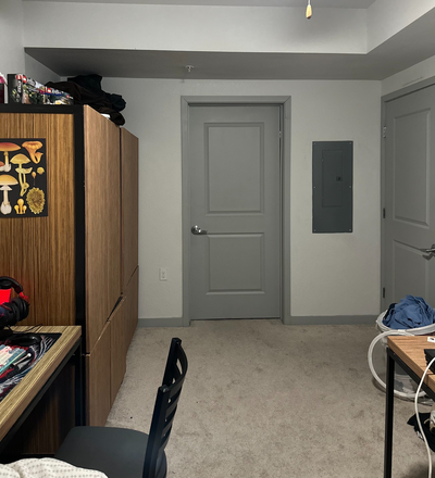 Bedroom with Ceiling Fan and In Room Desking - FOUND Study Downtown Berkeley Apartments