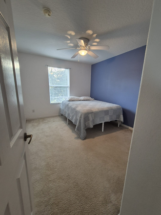 Bedroom - Beautiful Townhouse near shopping, restaurants, and transportation.