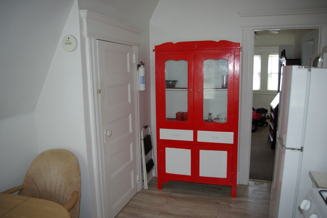 kitchen cupboard w/ pantry to left - 3 room fully furnished 3rd floor apt in owner-occupied home, heat & hot water supplied