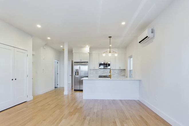 Kitchen/living room - apartment close to campus, less than 5 minutes walk to bus stop